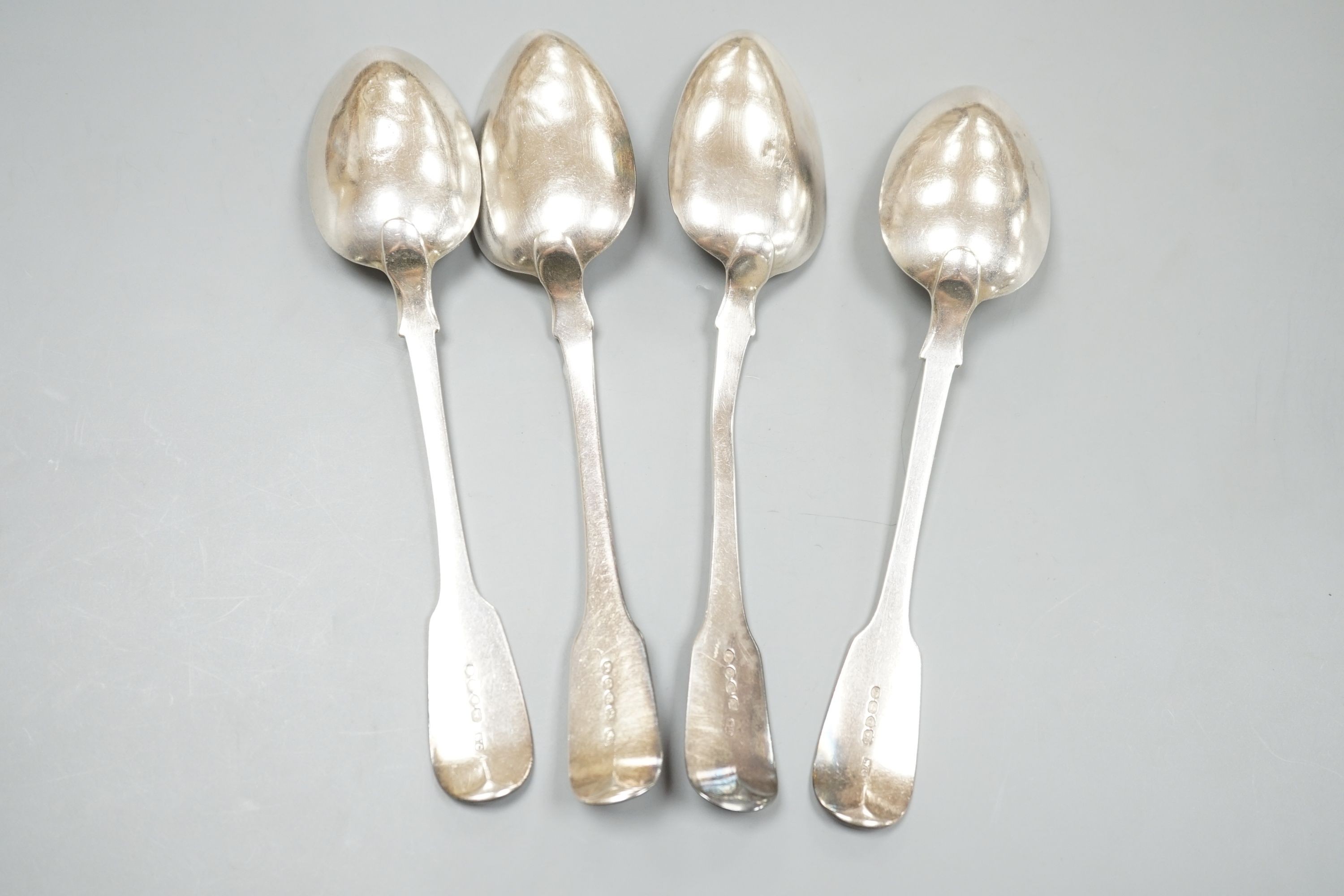 Two pairs of William IV silver fiddle pattern table spoons, London, 1831 and 1833, 9oz.